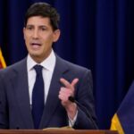 Presidente do Fed, Kevin Warsh, para simbolizar o impacto do Banco Central Americano nos negócios e a próxima reunião, marcada para 28 e 29 de julho