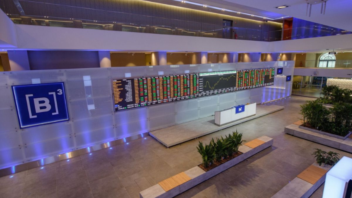 Oainel da B3 com gráficos e cotações, simbolizando que a vitória de Lula gera forte volatividade no mercado financeiro
